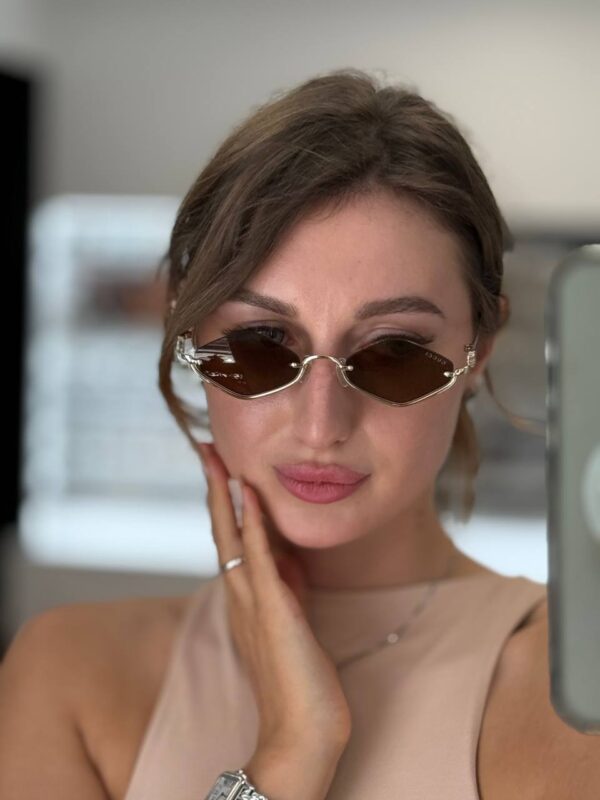 Солнцезащитные очки Gucci