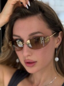Солнцезащитные очки Miu Miu