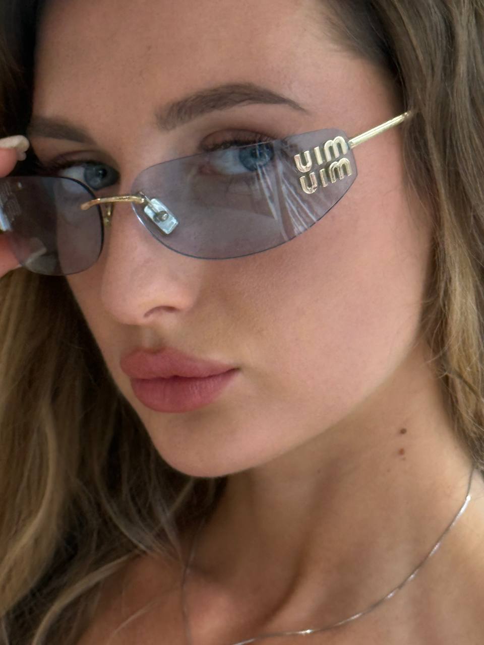 Солнцезащитные очки Miu Miu 2