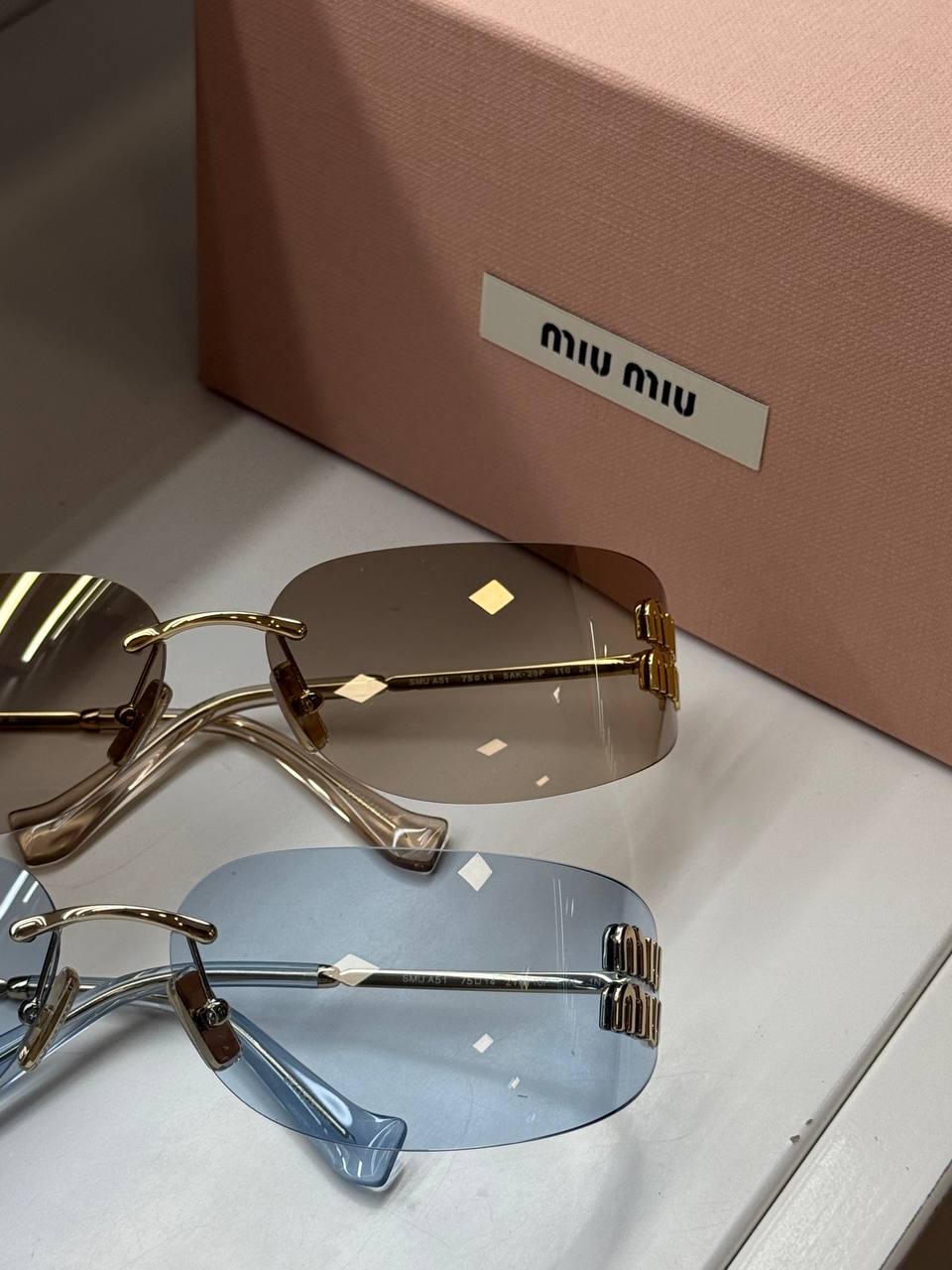Солнцезащитные очки Miu Miu 2