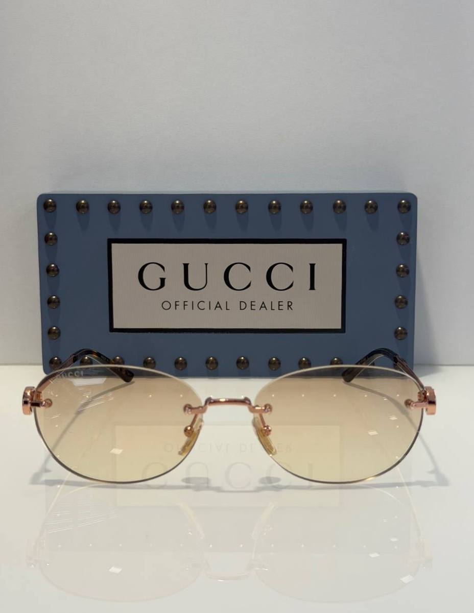 Солнцезащитные очки Gucci