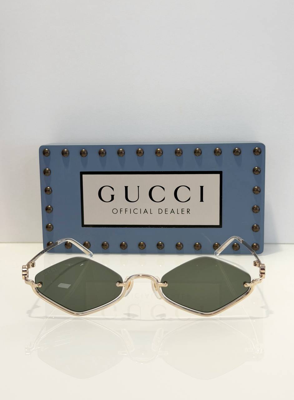 Солнцезащитные очки Gucci