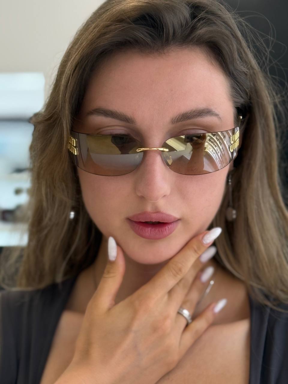 Солнцезащитные очки Miu Miu