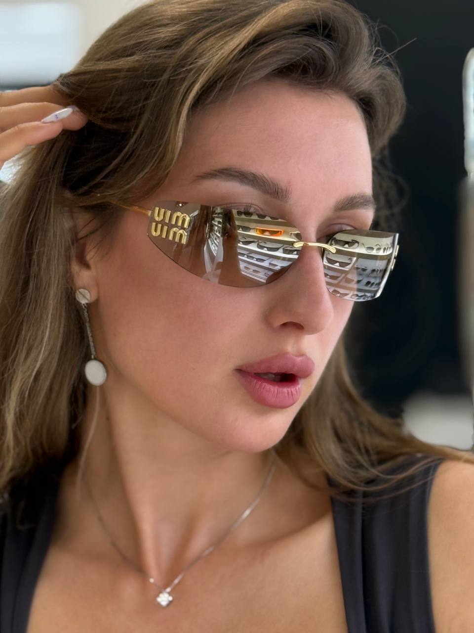 Солнцезащитные очки Miu Miu