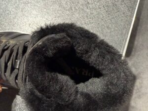 Высокие кеды Prada с мехом